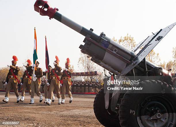 Indian Border Security Force carry Indian national flag during a passing out parade on November 16, 2013 in Humhama, on the outskirts of Srinagar,...