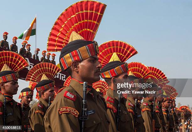 Indian Border Security Force soldiers stand in formation during their passing out parade on November 16, 2013 in Humhama, on the outskirts of...