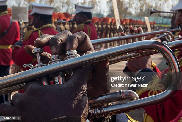Music band of Indian Border Security Force perform during a passing out parade on November 16, 2013 in Humhama, on the outskirts of Srinagar, the...