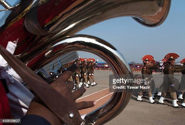 Indian Border Security Force soldier march during their passing out parade on November 16, 2013 in Humhama, on the outskirts of Srinagar, the summer...