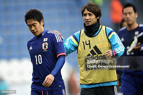 Shinji Kagawa of Japan and teammate Hajime Hosogai react after the International Friendly match between the Netherlands and Japan on November 16,...