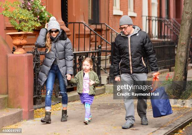 Matthew Broderick, Sarah Jessica Parker and Tabitha Broderick as seen in Soho on November 15, 2013 in New York City.