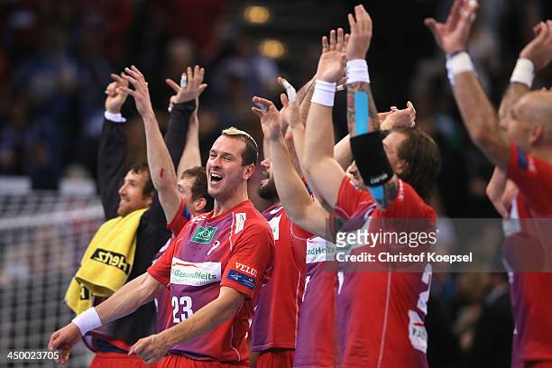 The team of Hamburg with Pascal hens of Hamburg celebrates after the VELUX EHF Handball Champions League group D match between HSV Hamburg and SG...