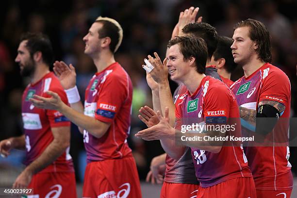 The team of Hamburg with Hans Lindberg celebrates after the VELUX EHF Handball Champions League group D match between HSV Hamburg and SG...