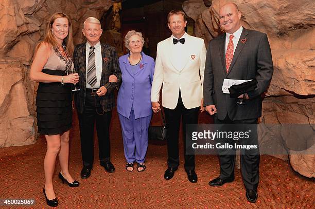 Professional Golfer Retief Goosen poses with his parents and guests during the Gala Dinner and Charitable Auction of the Gary Player Invitational...