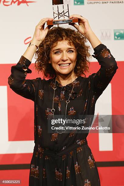 Actress Valeria Golino poses with her L.A.R.A. Award for the Best Italian Actor at the Collateral Awards Winners Photocall during the 8th Rome Film...