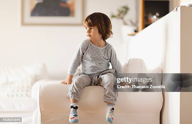 portrait of a small boy - boy sitting stock pictures, royalty-free photos & images