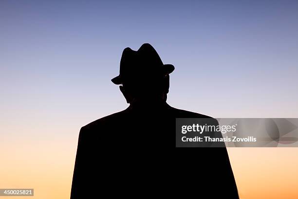portrait of a senior man - old silhouette man stockfoto's en -beelden