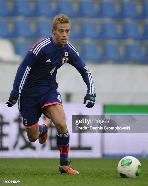 Keisuke Honda of Japan controls the ball during the International Friendly match between the Netherlands and Japan on November 16, 2013 in Genk,...