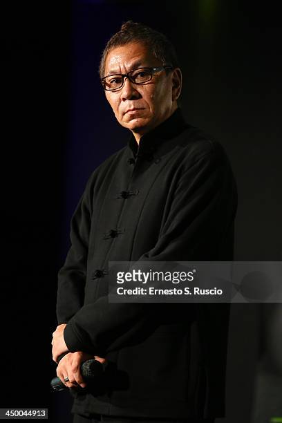 Takashi Miike meets the audience during the 8th Rome Film Festival at the Auditorium Parco Della Musica on November 16, 2013 in Rome, Italy.