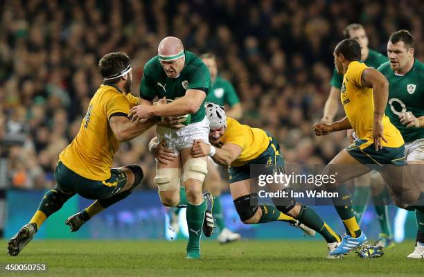 Ben Mowen of Australia tries to tackle Paul O'Connell of Ireland during the International match between Ireland and Australia at Aviva Stadium on...