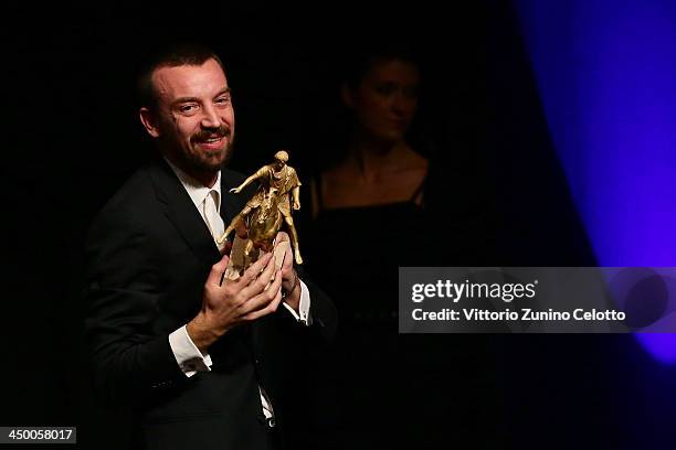 Director Alberto Fasulo accepts his award after winning the Golden MarcAurelio Award for Best Film for Tir at the Official Award Ceremony during the...