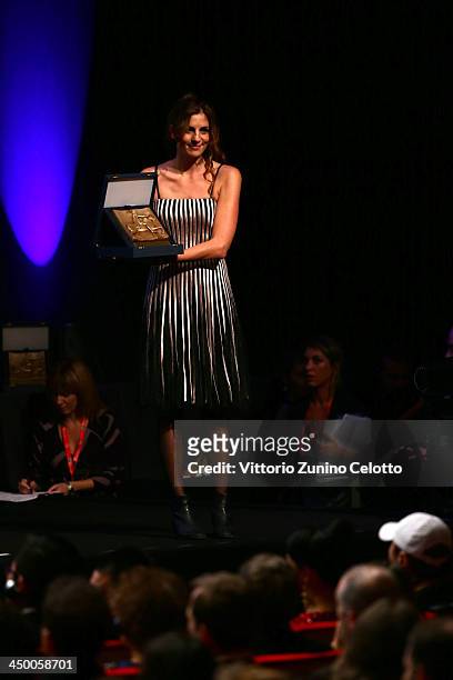 Director Elisa Amoruso poses with her Special Mention Award as she attends the Official Award Ceremony during the 8th Rome Film Festival at the...