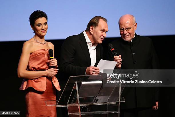Hostess Anna Foglietta jury member actor Aleksei Guskov and Rome Film Festival director Marco Mueller attend the Official Award Ceremony during the...