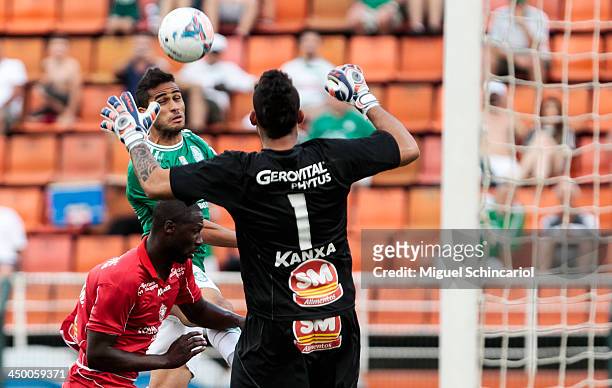 Alan Kardec of Palmeiras fights for the ball with Rodrigo Souza and goalkeeper Douglas of Boa Esporte during the match between Palmeiras and Boa...