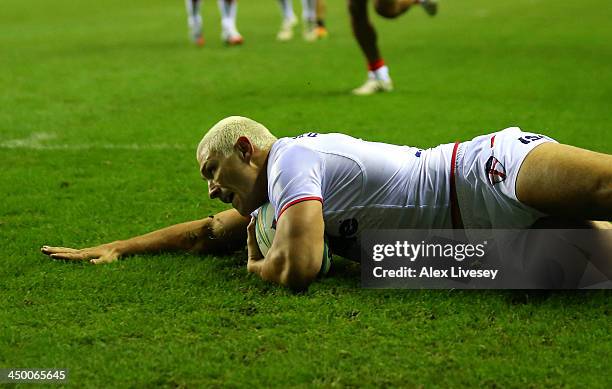 Ryan Hall of England slides over the line to score his second try during the Rugby League World Cup Quarter Final match between England and France at...