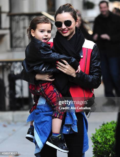 Miranda Kerr and Flynn Bloom are seen in Midtown on November 16, 2013 in New York City.