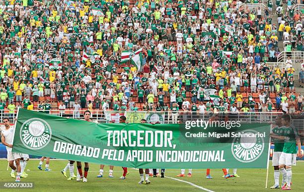 Players of Palmeiras celebrate after the match between Palmeiras and Boa Esporte for the Brazilian Championship Series B 2013 at Pacaembu Stadium on...