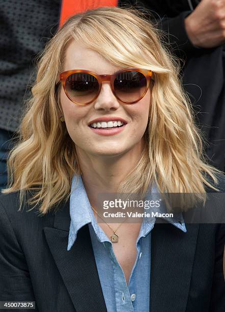 Actress Emma Stone poses at "The Amazing Spiderman 2" Los Angeles Photo Call at Sony Pictures Studios on November 16, 2013 in Culver City, California.