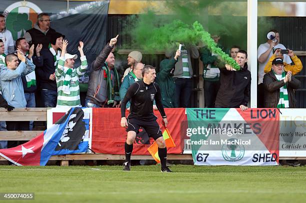 Visiting Glasgow Celtic Fans let off flares during the Ebac Division One football match between Celtic Nation and Hebburn Town on November 16, 2013...