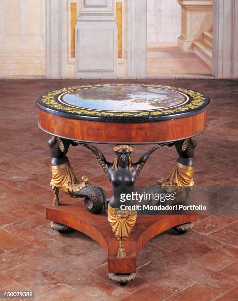 Table , by Manufacture of Lucca - Pietro Della Valle 19th Century, carved, painted and gilded wood, partly veneered, 81 x 87 cm.