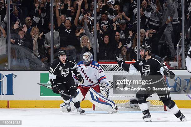 Justin Williams and Tanner Pearson of the Los Angeles Kings celebrate after defeating the New York Rangers in overtime of Game One of the Stanley Cup...