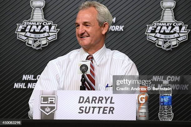 Darryl Sutter of the Los Angeles Kings answers questions from the media following his team's victory over the New York Rangers in Game One of the...