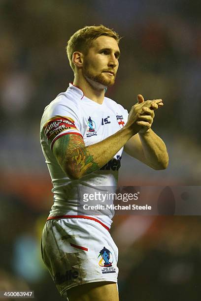 Sam Tomkins of England applauds the home support on a lap of honour during the Rugby League World Cup Quarter Final match between England and France...