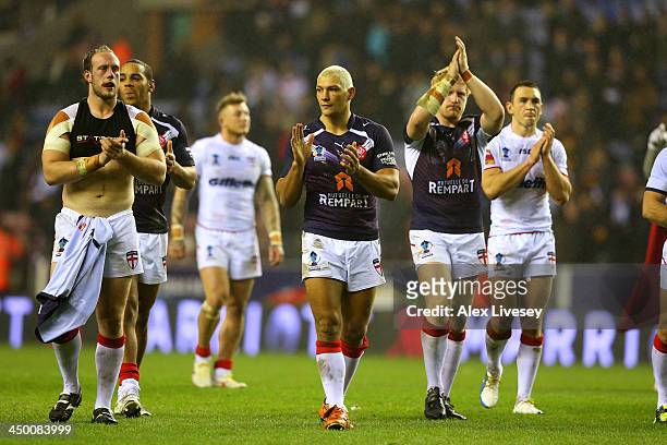 Ryan Hall of England leads his team mates around the pitch after the Rugby League World Cup Quarter Final match between England and France at DW...
