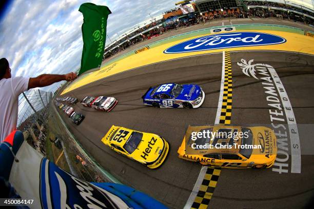 Sam Hornish Jr., driver of the Alliance Truck Parts Ford, leads the field to the green flag to start the NASCAR Nationwide Series Ford EcoBoost 300...