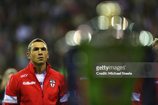 Kevin Sinfield the captain of England looks towards the world cup trophy as he lines up for the national anthems during the Rugby League World Cup...