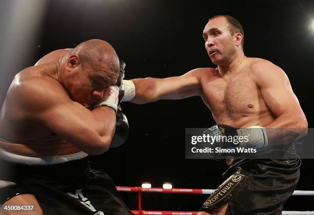 Alexander Ustinov lands a punch to the head of David Tua during the bout between David Tua and Alexander Ustinov at Claudelands Arena on November 16,...