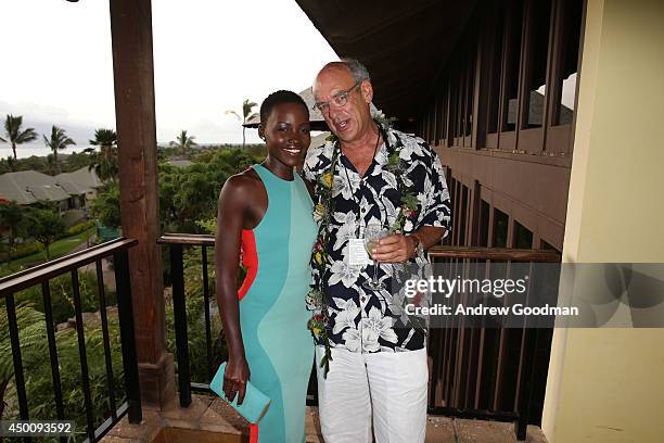 Lupita Nyong'o and Shep Gordon attend the Opening Night Reception for the 2014 Maui Film Festival at Wailea on June 4, 2014 in Wailea, Hawaii.