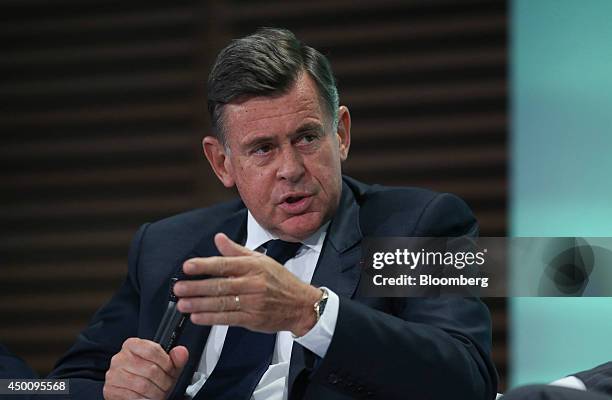 Georges Plassat, chief executive officer of Carrefour SA, gestures as he speaks during the Freedom and Solidarity Forum in Caen, France, on Thursday,...