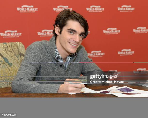 Actor RJ Mitte signs autographs and launches the 4th Annual "Share The Joy" Program With Cost Plus World Market on November 16, 2013 in Los Angeles,...