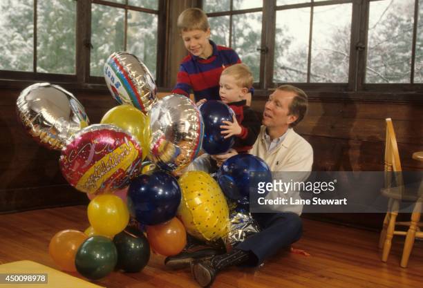 Portrait of Michigan head coach Steve Fisher with sons Mark and Jonathan during photo shoot at home. Ann Arbor, MI 4/7/1989 CREDIT: Lane Stewart