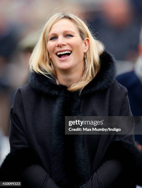 Zara Phillips watches the Paddy Power Gold Cup Steeple Chase at Cheltenham Racecourse on November 16, 2013 in Cheltenham, England.