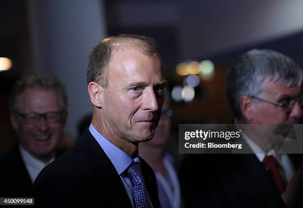 Thomas "Tom" Enders, chief executive officer of Airbus Group NV, center, attends the Freedom and Solidarity Forum in Caen, France, on Thursday, June...