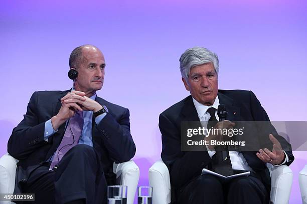 Maurice Levy, chief executive officer of Publicis Groupe SA, right, speaks beside John Rice, vice chairman of General Electric Co., during the...