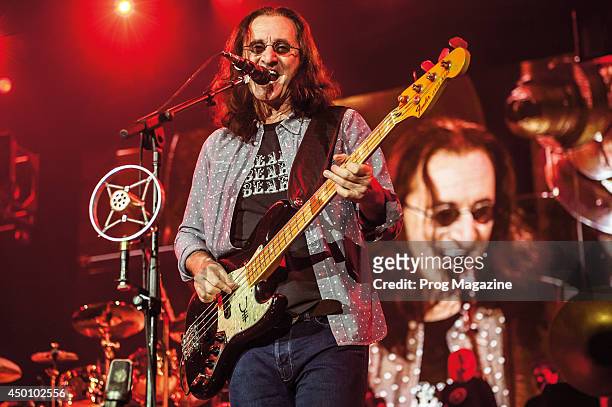 Bassist and lead vocalist Geddy Lee of Canadian rock group Rush performing live on stage at the O2 Arena in London, on May 25, 2013.