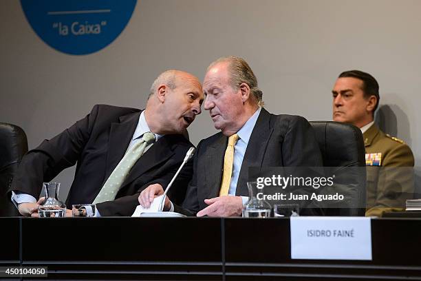 King Juan Carlos of Spain and Spanish Culture Minister Jose Ignacio Wert attend the Delivery of 'La Caixa' Scholarships in Madrid on June 5, 2014 in...