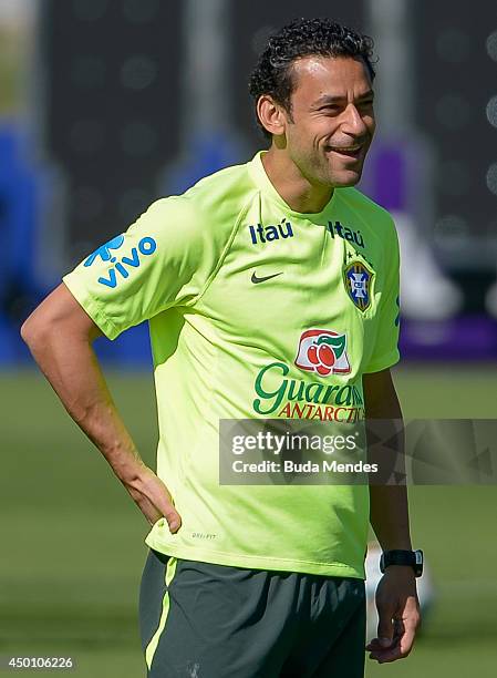 Fred smiles during a training session of the Brazilian national football team at the squad's Granja Comary training complex, in Teresopolis, 90 km...