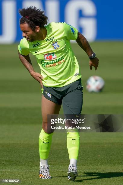 Marcelo reacts during a training session of the Brazilian national football team at the squad's Granja Comary training complex, in Teresopolis, 90 km...