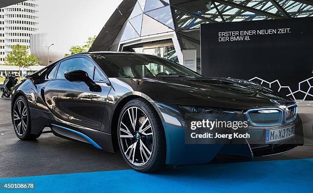 I8 plug-in hybrid sports car is shown in front of the BMW World shortly before the official launch of the BMW i8 on June 5, 2014 in Munich, Germany....