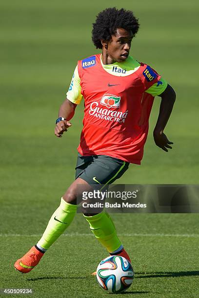 William in action during a training session of the Brazilian national football team at the squad's Granja Comary training complex, in Teresopolis, 90...