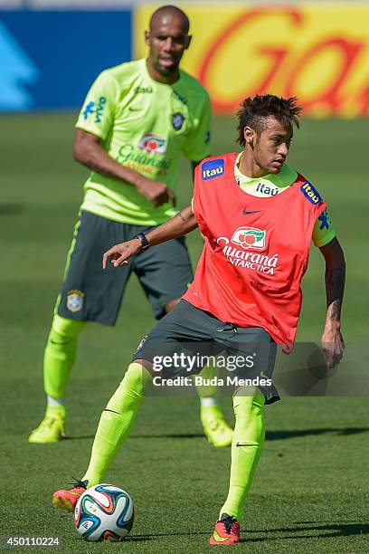 Neymar and Maicon take part in a training session of the Brazilian national football team at the squad's Granja Comary training complex, in...