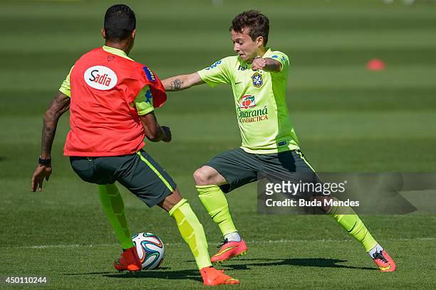 Hulk and Bernard take part in a training session of the Brazilian national football team at the squad's Granja Comary training complex, in...
