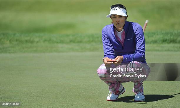 Michele Wie lines up her birdie putt attempt on the 12th hole during the first round of the Manulife Financial LPGA Classic at the Grey Silo Golf...