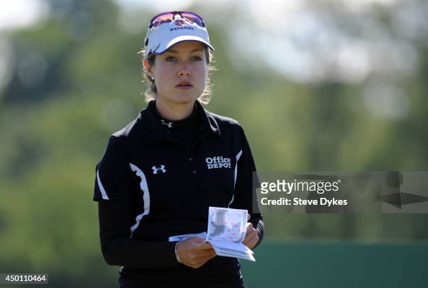 Alejandra Llaneza, of Mexico, checks he yardage book on the ninth hole during the first round of the Manulife Financial LPGA Classic at the Grey Silo...