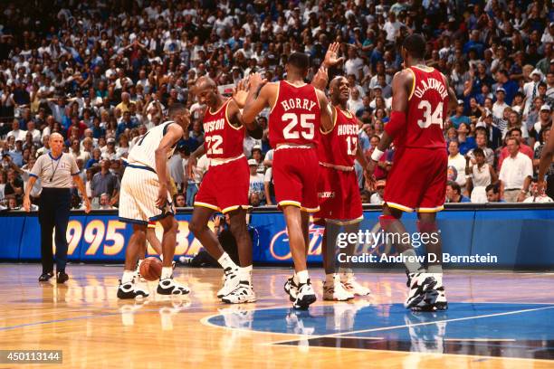 Hakeem Olajuwon of the Houston Rockets hits the game winning shot against the Orlando Magic during Game One of the 1995 NBA Finals on June 7, 1995 at...